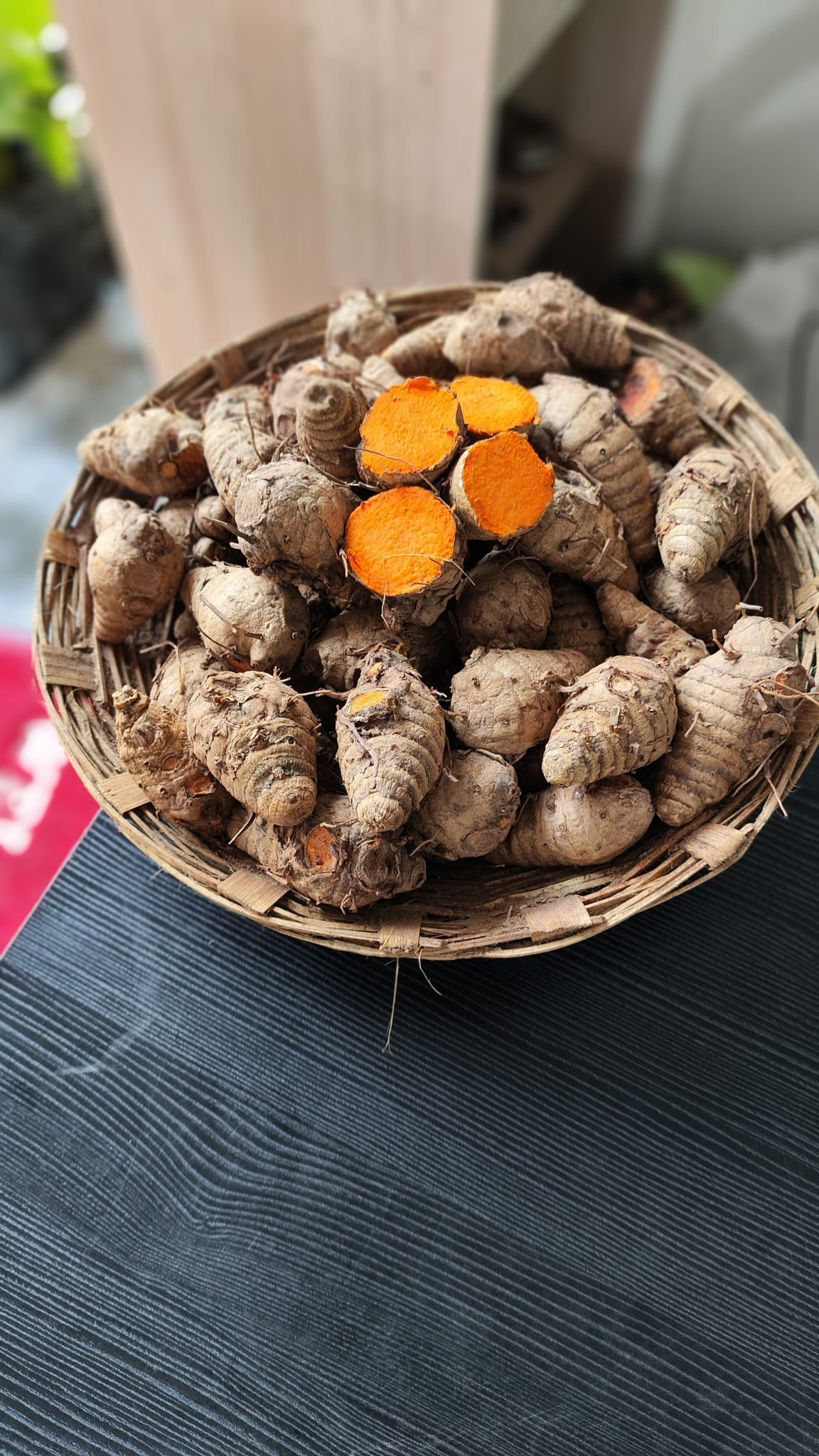 Turmeric sticks full of curcumin in a basket.